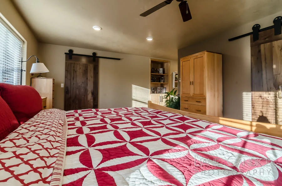 jewel toned bedroom sheets in remodeled bedroom by corvallis kitchen and bath