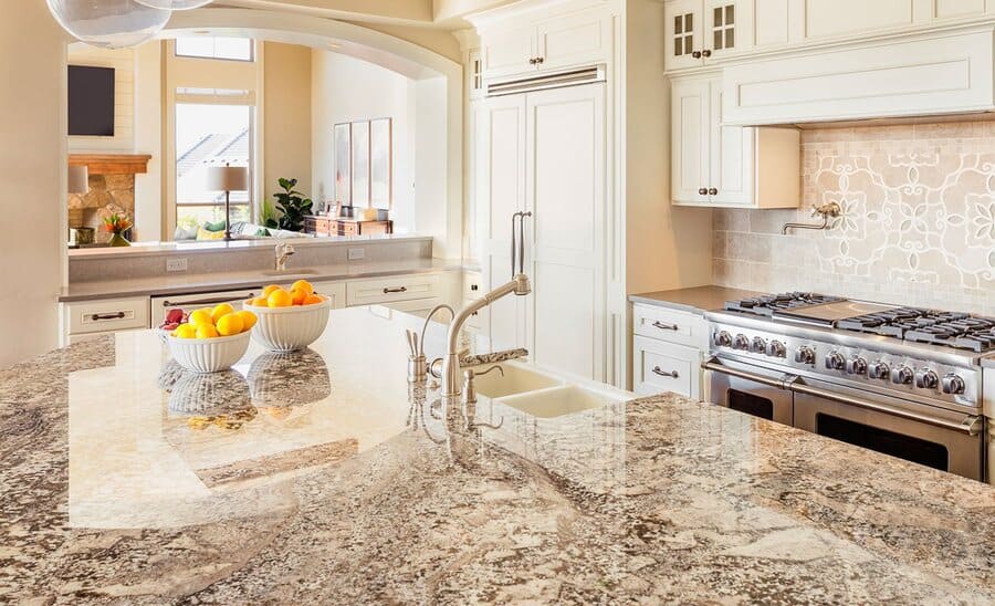 light granite countertop on kitchen island - image by housely