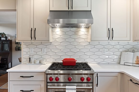 stainless steel oven with red accents in remodeled kitchen by corvallis custom kitchens and baths in corvallis oregon