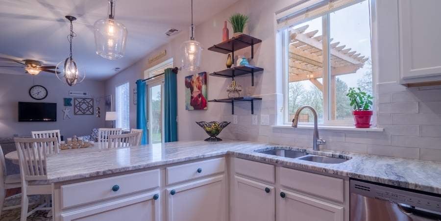 Remodeled kitchen with organization shelves.