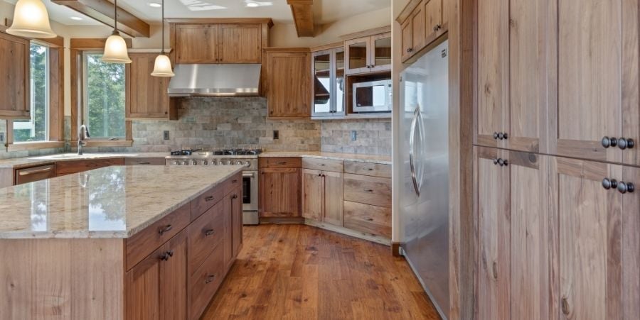 Kitchen remodel with granite countertops and stainless steel appliances. 