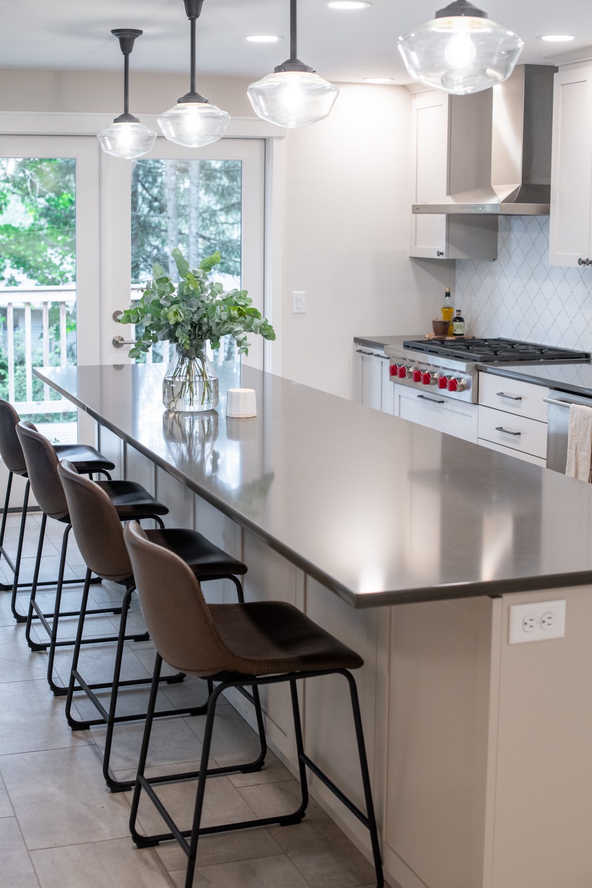 Large Island with Seating In Kitchen Remodel By Corvallis Custom Kitchens & Baths